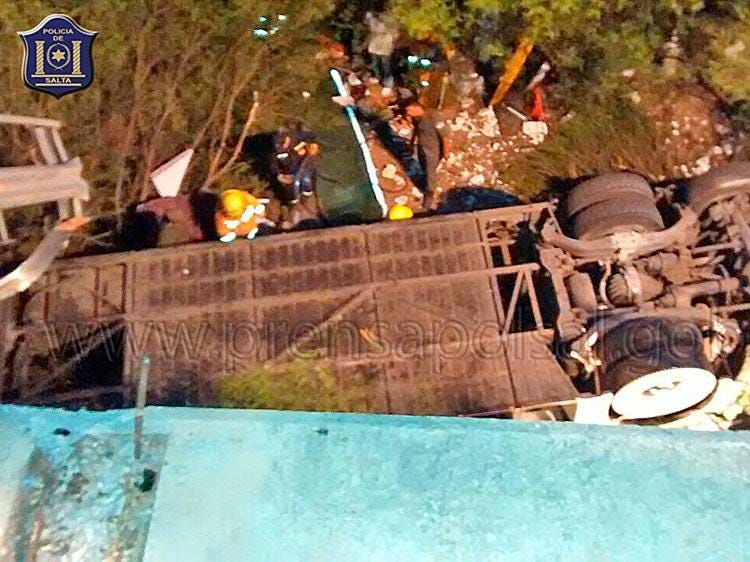 The bus flipped and fell off the bridge