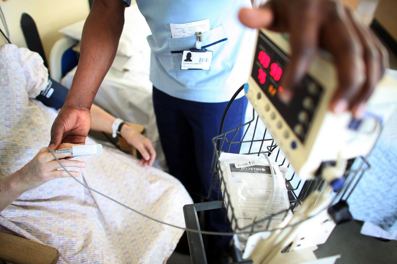 A nurse tends to a patient at the Queen Elizabeth Hospital in Birmingham
