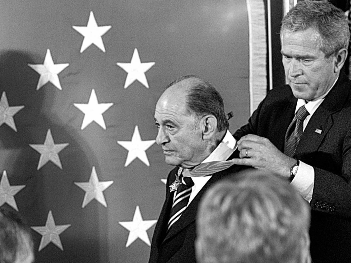 President Bush gives Rubin his award at the White House in 2005