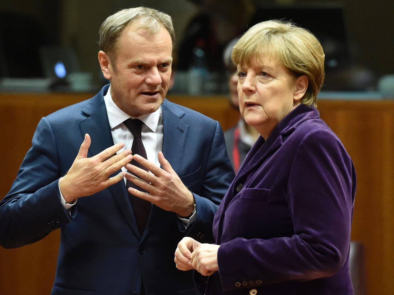 European Council president Donald Tusk, left, with German Chancellor Angela Merkel at the European Union (EU) summit 