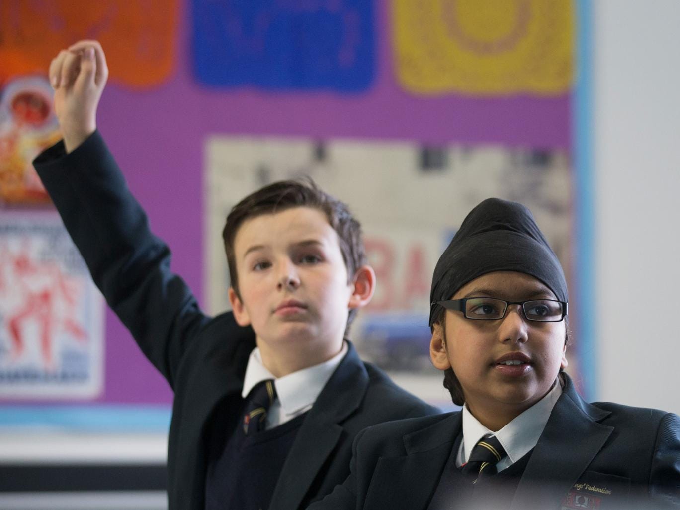 Pupils take part in a Spanish lesson at the Ridings Federation Winterbourne International Academy in Winterbourne near Bristol 