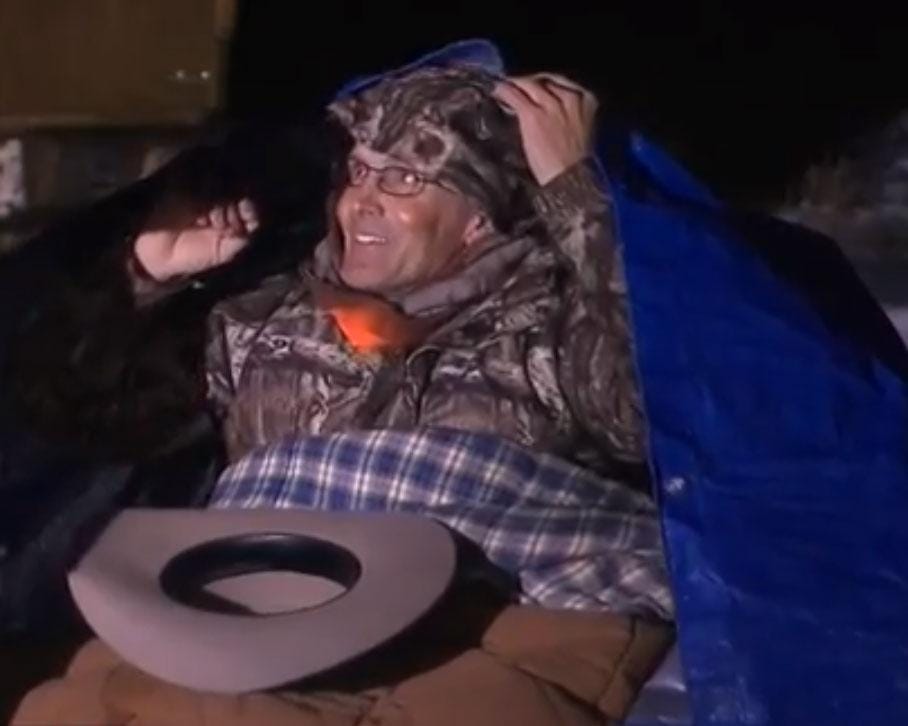Lavoy Finicum, 55, protests under a tarp at a refuge in Oregon