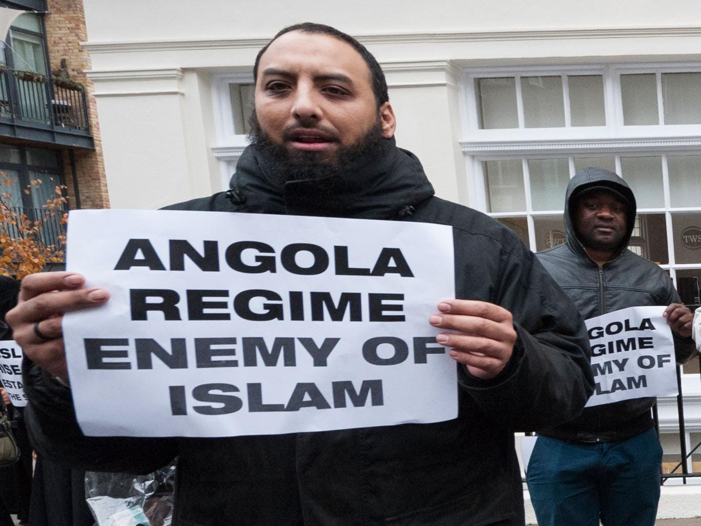 Mohammed Reza Haque protests outside the Angolan embassy in London in 2013