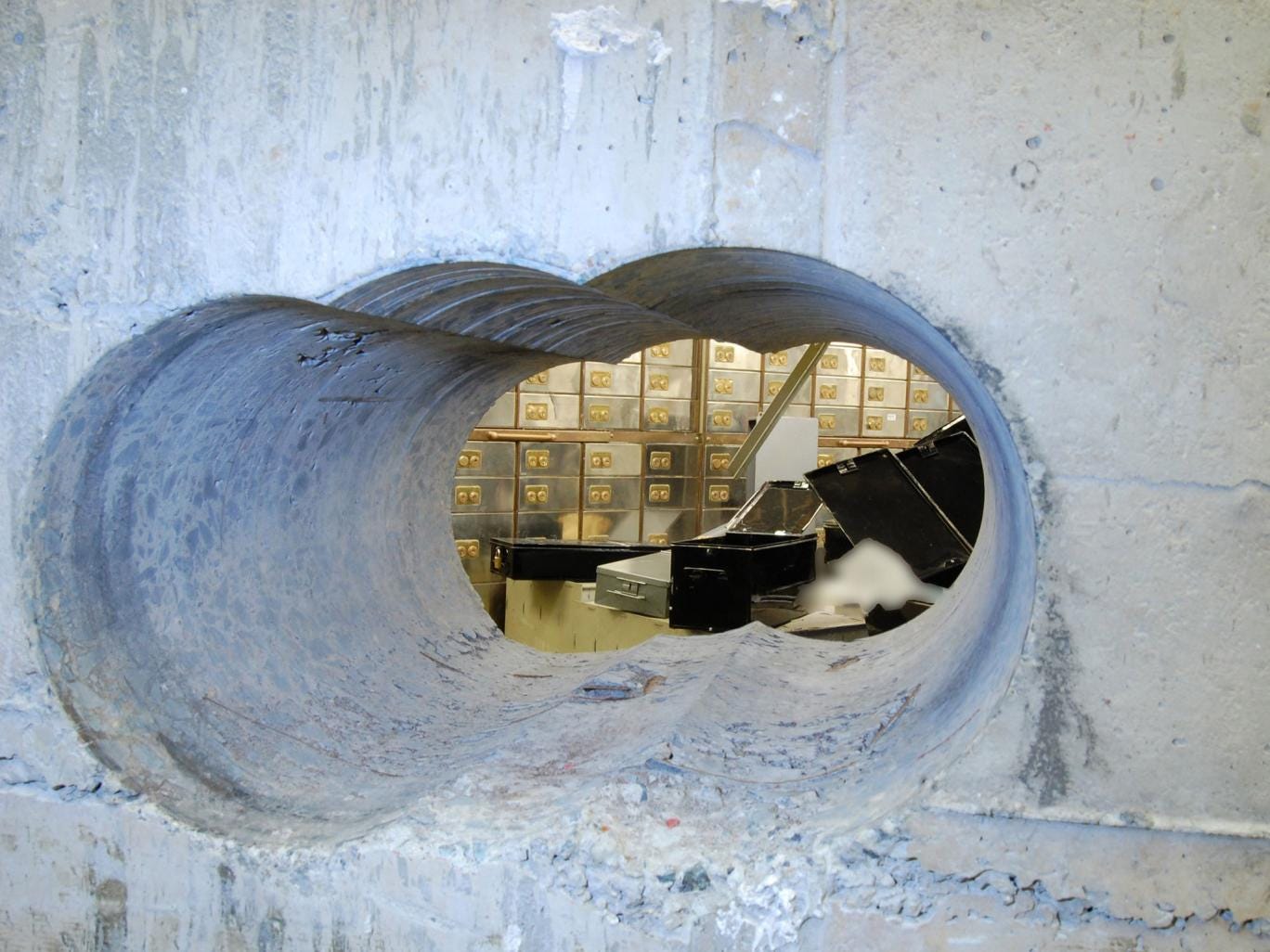The hole drilled in the vault wall at Hatton Garden Safe Deposit Limited following the Easter weekend robbery