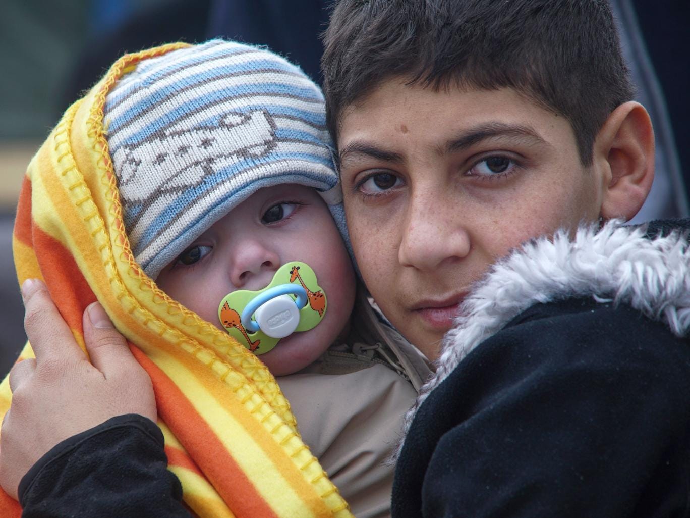 Two child refugees who reached the Greek island of Lesbos from Turkey