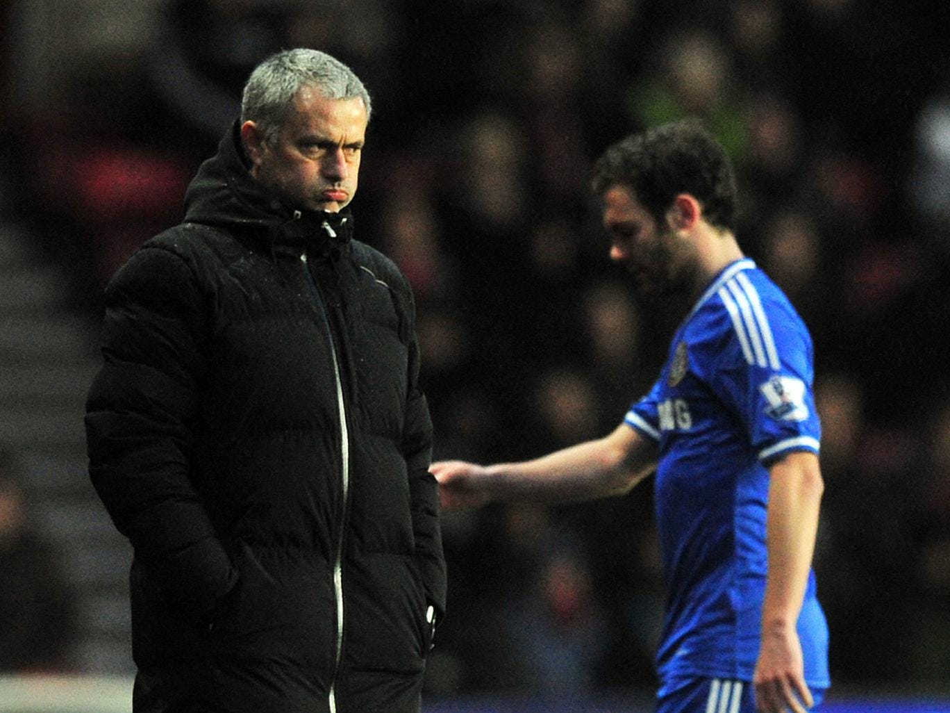 Juan Mata walks off the field without acknowledging his manager Jose Mourinho