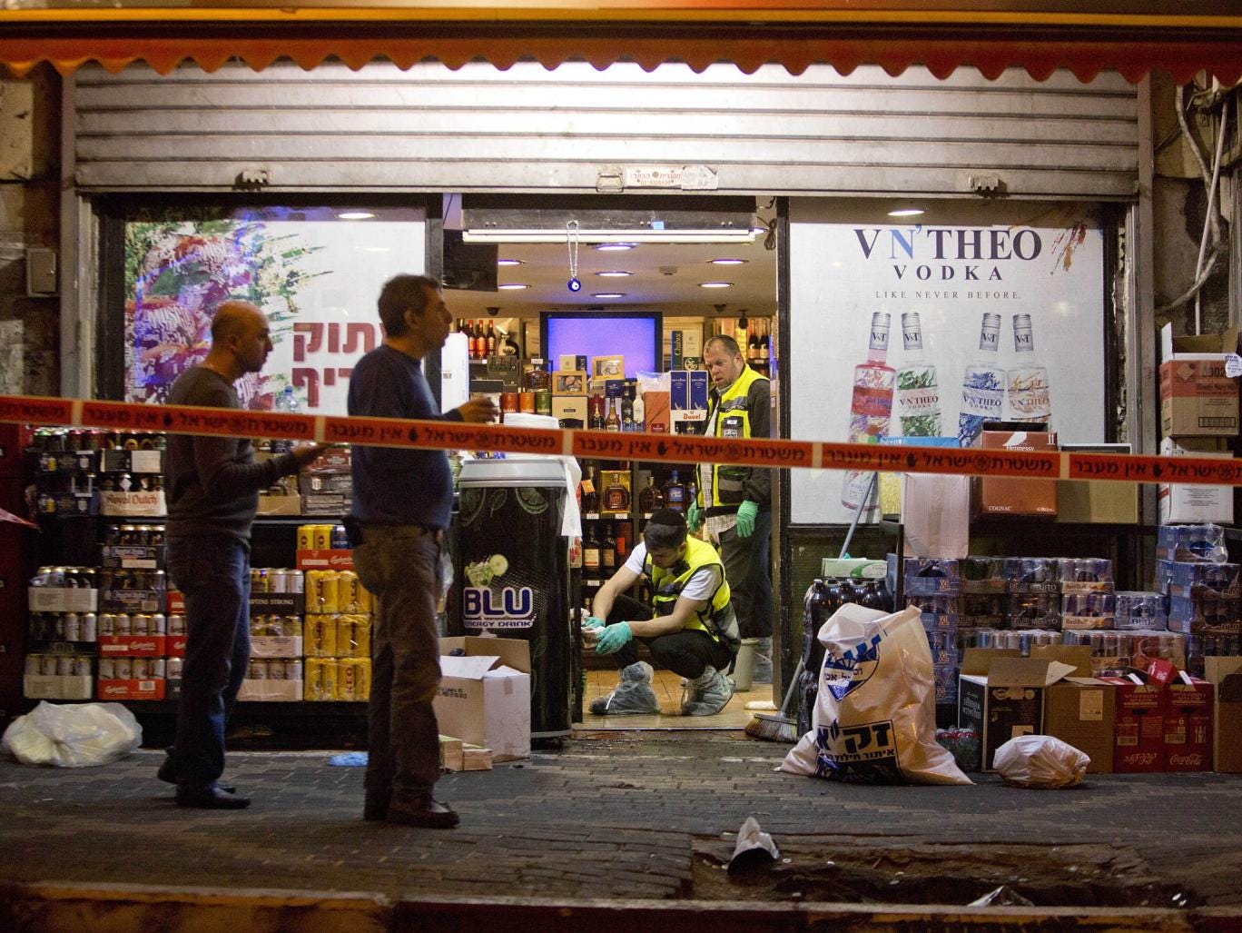 wine-shop-attacker-stab-neck.jpg
