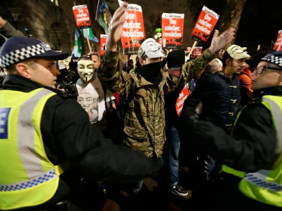 5-masked-demonstrators-AP.jpg