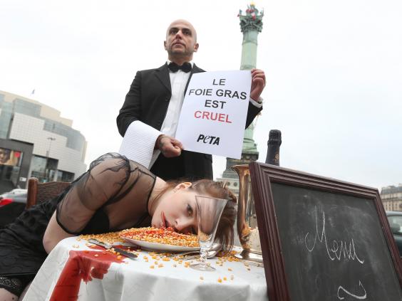 Peta protesting against foie gras production in Paris in 2012 (Getty Images)