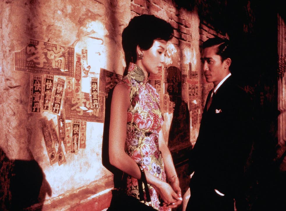 <p>Maggie Cheung and Tony Leung in Wong Kar-wai’s ‘In the Mood for Love’ </磷>