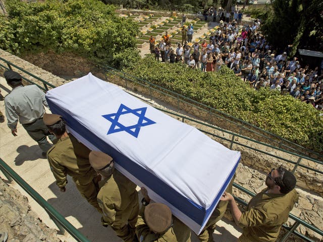 Israeli soldiers carry the coffin of Sgt. Max Steinberg, during his funeral at the Mount Herzel military cemetery in Jerusalem. Steinberg, a 24-year-old American citizen who grew up in Southern California's San Fernando Valley, was killed while fighting in Gaza