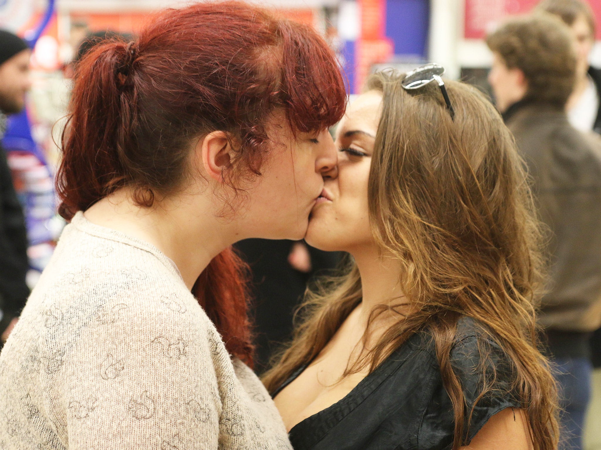 Three girls kissing