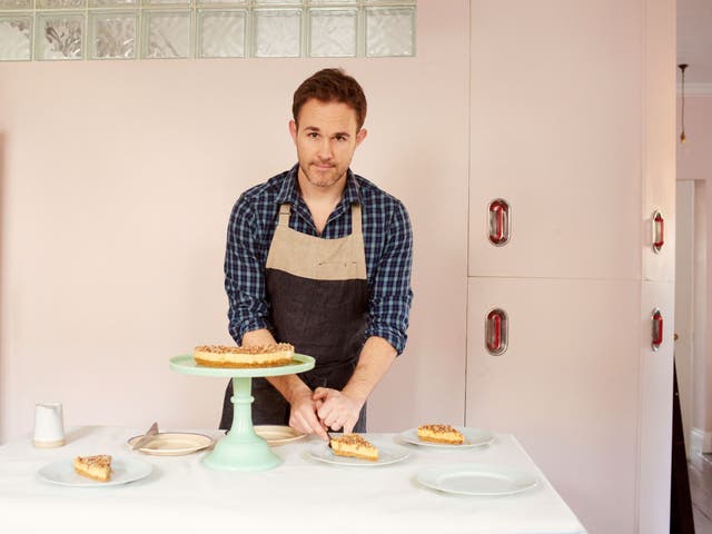 Ed serving his pumpkin, gingernut, maple and pecan cheesecake