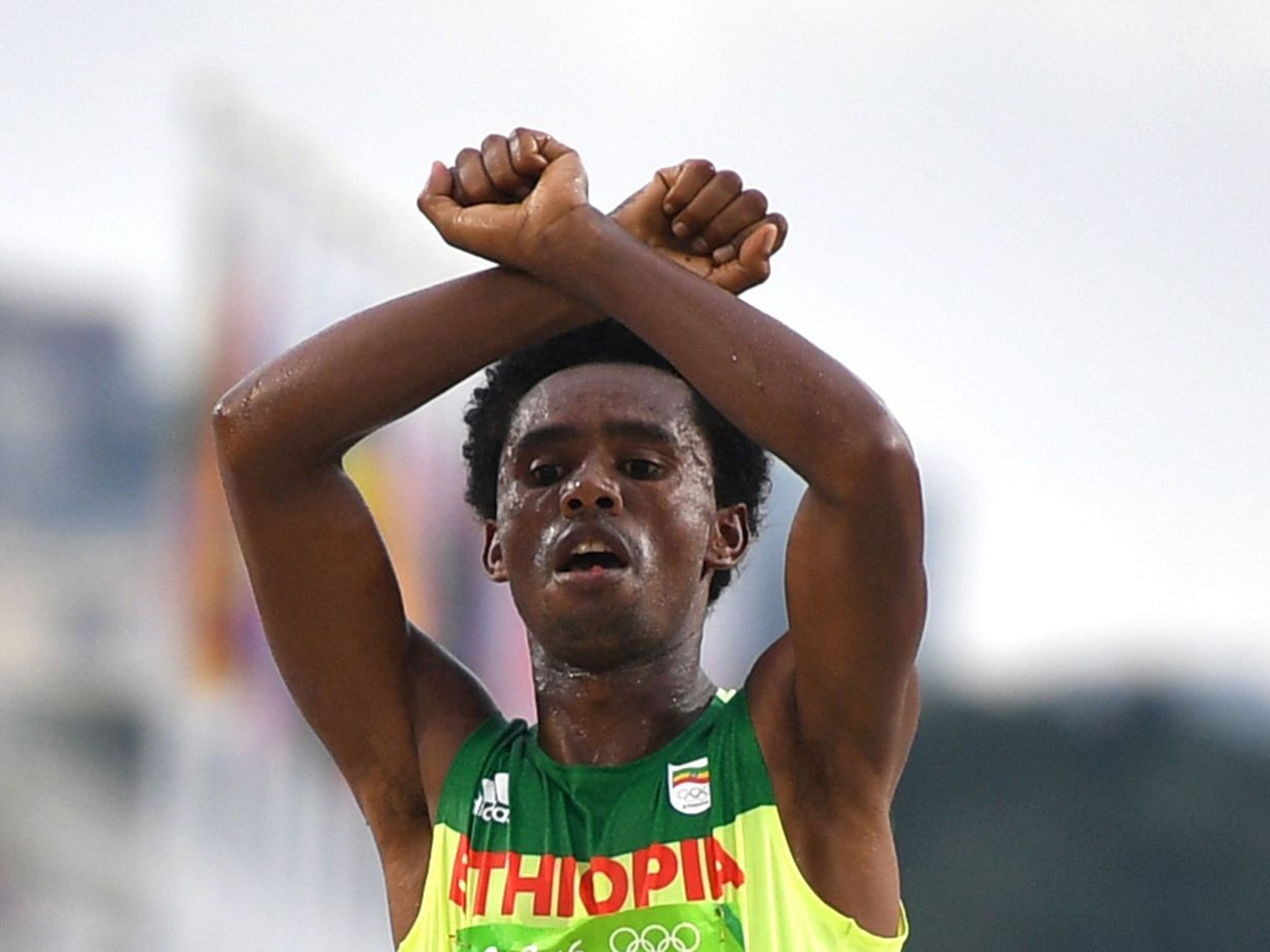 Ethiopian marathon runner could go to jail for anti-government protest on the finishing line