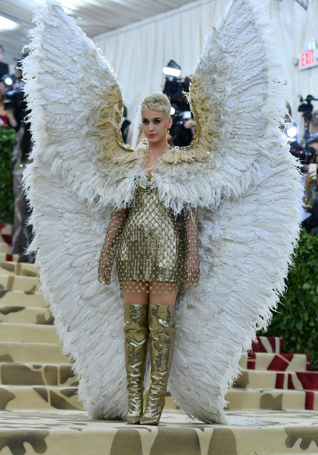 Katy Perry incorporated the theme with oversized wings, a Versace chainmail dress and thigh high boots