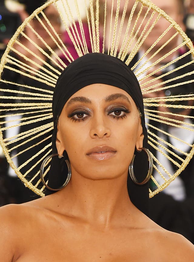 Solange Knowles opted for a structural black Iris van Herpen dress and a halo headpiece with a black du-rag