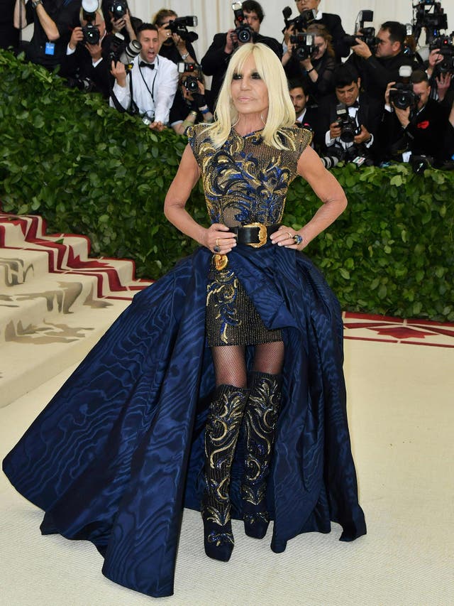 Donatella Versace, who was co-host for the event, opted for an ornate navy and gold dress of her own design
