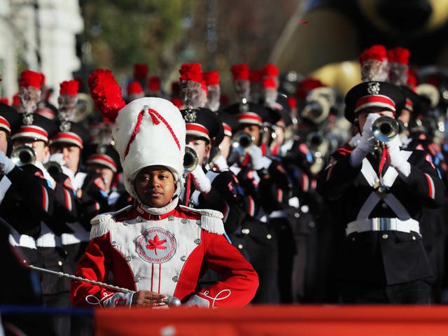 A marching band takes part in the parade