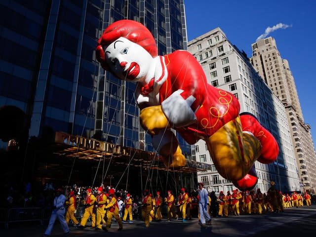 The Ronald McDonald balloon flies in the parade