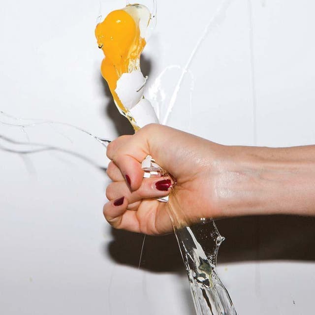 The instantly iconic cover of It’s Blitz! shows little but says a lot. There’s a sense of female defiance in showing the woman’s hand, nails in red polish, crushing the egg, a symbol of fertility. It also embodies what the Yeah Yeah Yeahs did on this album, which is take traditional sounds, equipment and ideas and scramble them into something completely subversive.