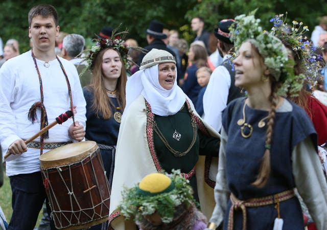 People participate in the traditional Lithuanian celebration of the summer solstice in Vilnius