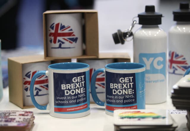 "GET BREXIT DONE" mugs alongside other Conservative merchandise at the party conference in Manchester on 29 9月