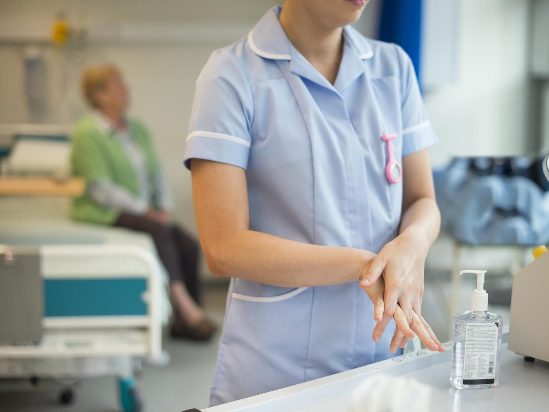 Nurse washes hands after hospital