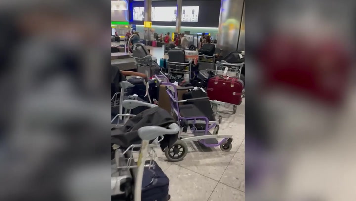 Sea of luggage piles up at Heathrow airport amid baggage handling meltdown