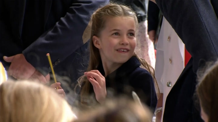 Princess Charlotte playfully attempts to conduct orchestra in Wales
