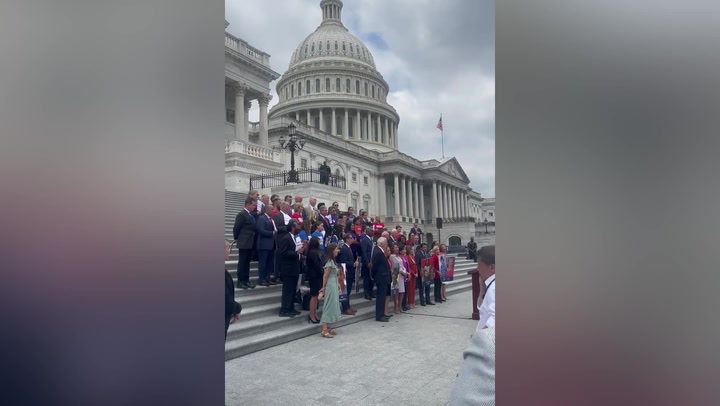 House Democrats sing 'God Bless America' outside of Supreme Court