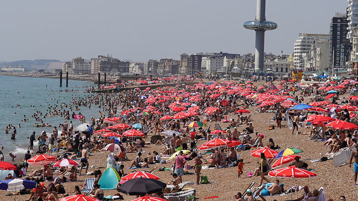UK records hottest day on record as temperature reaches 39.1C amid heatwave
