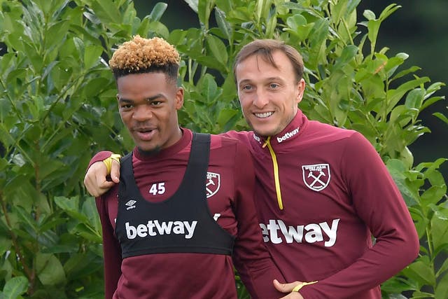 West Ham captain Mark Noble (right) with Grady Diangana