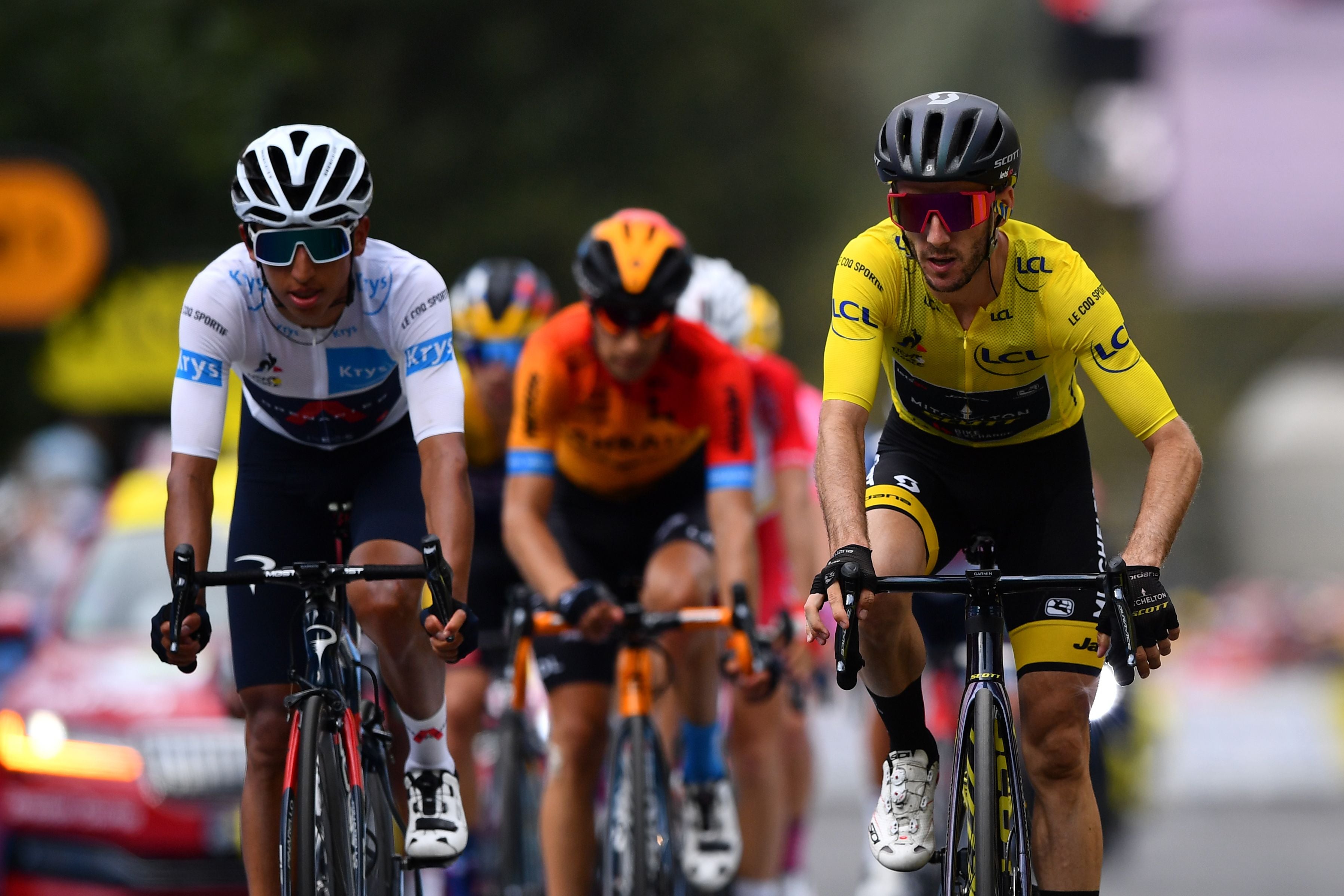 Egan Bernal and Adam Yates cross the finish line