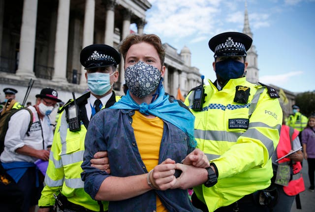 Extinction Rebellion tries to keep focus on the climate crisis during a protest in Trafalgar Square, despite the pandemic