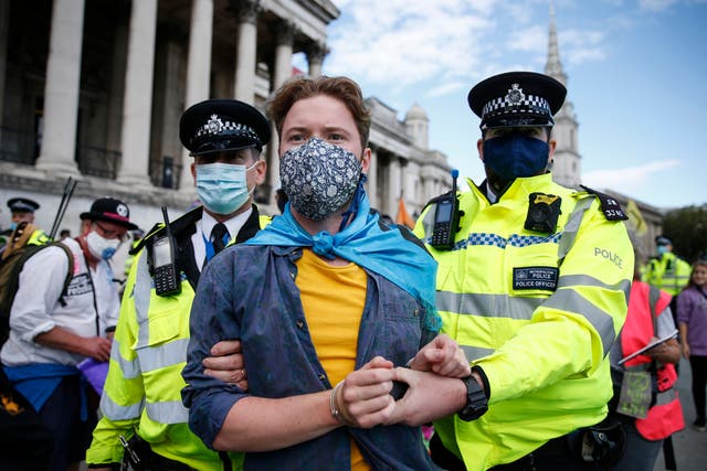 Extinction Rebellion tries to keep focus on the climate crisis during a protest in Trafalgar Square, despite the pandemic