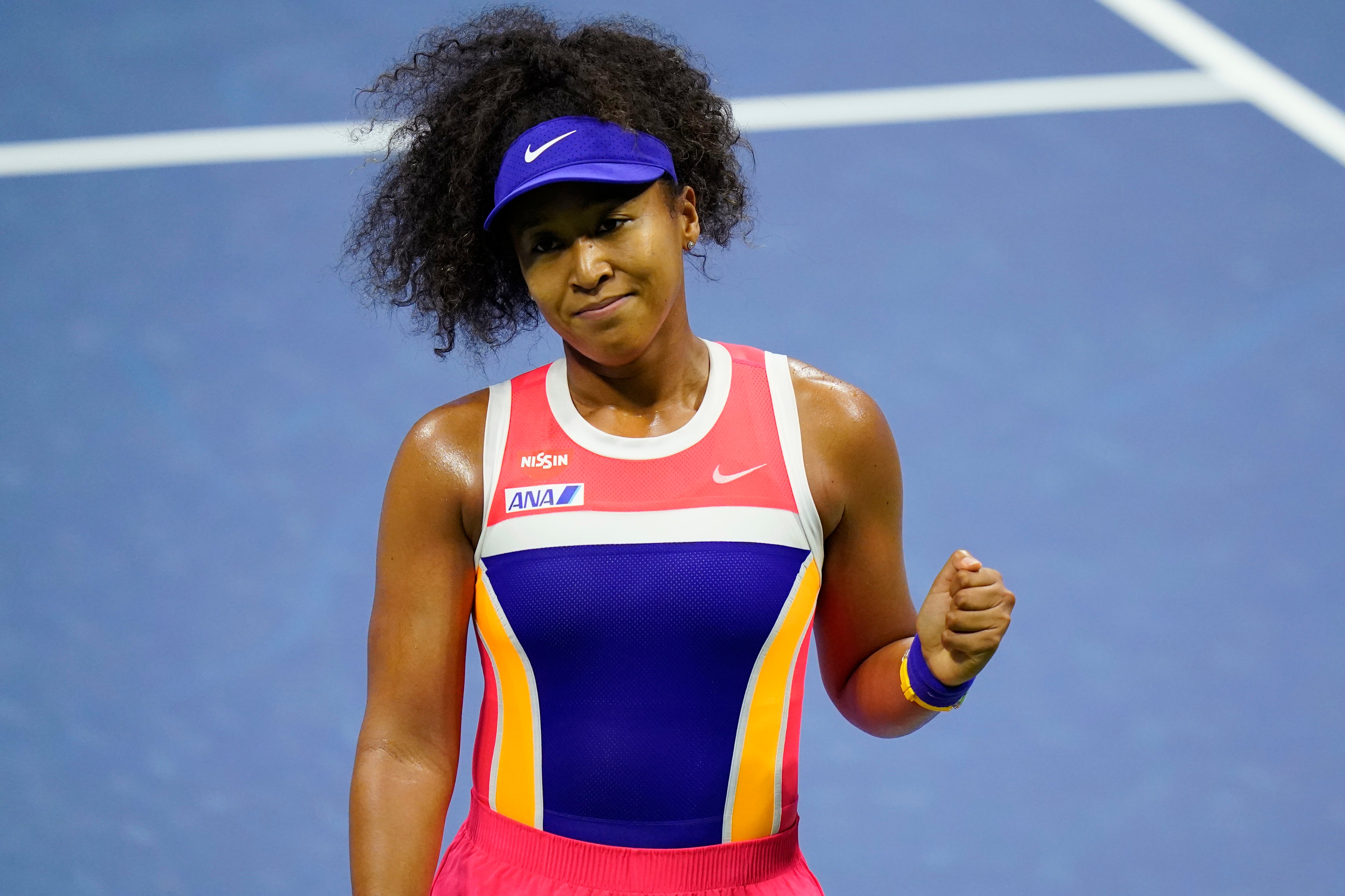 Naomi Osaka celebrates her win over Anett Kontaveit