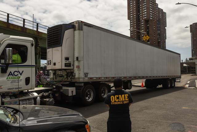 A refrigerator truck to be used as a makeshift morgue is parked at NYU Langone Hospital 