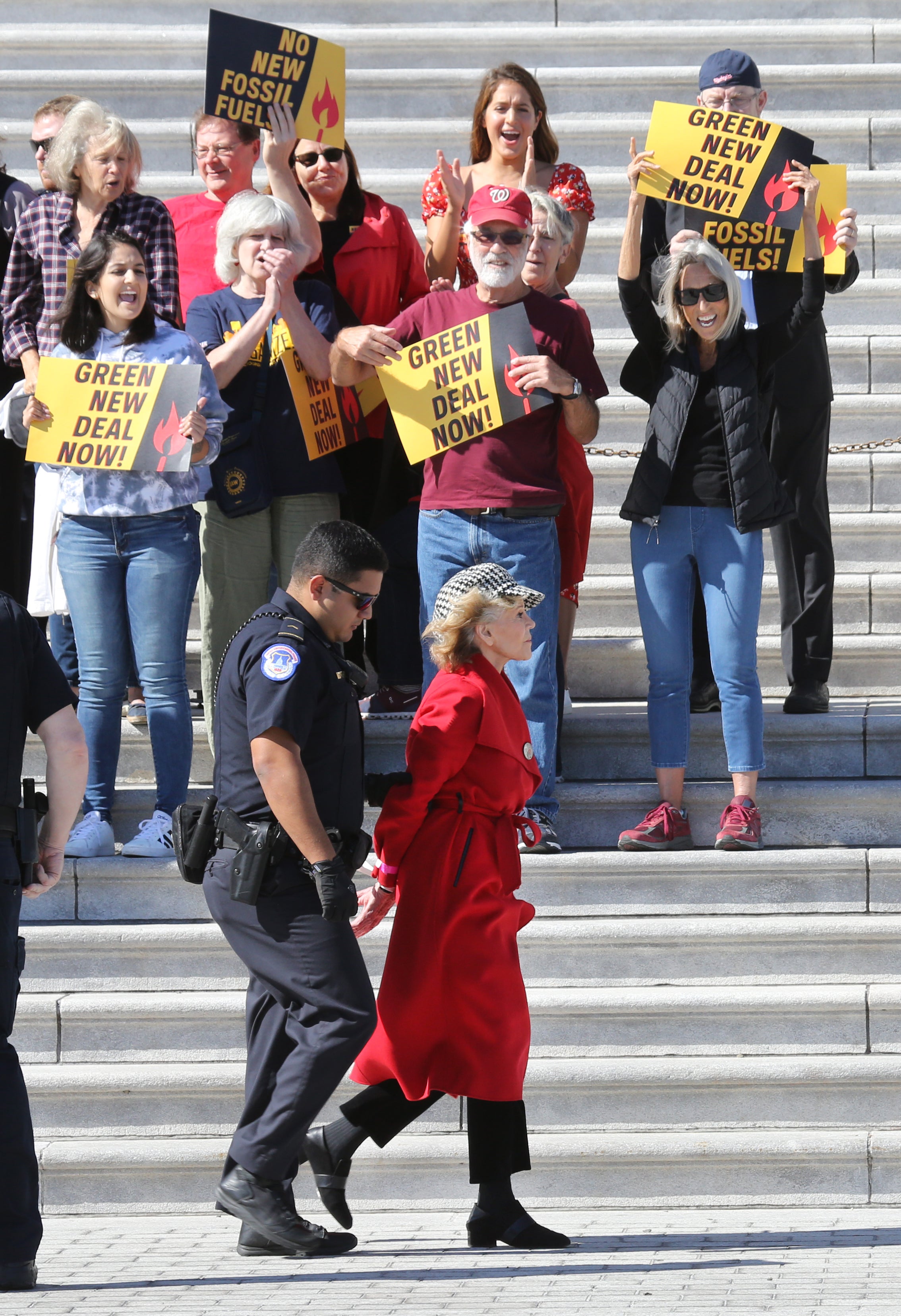 Jane Fonda is arrested and marched off to central booking