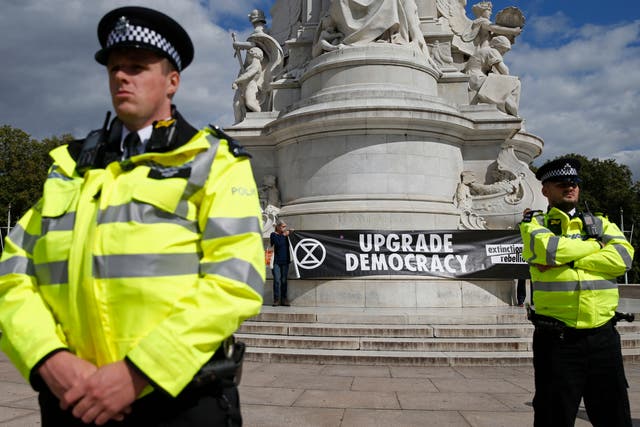 Police officers observing Extinction Rebellion demonstration outside Buckingham Palace 5 September, 2020