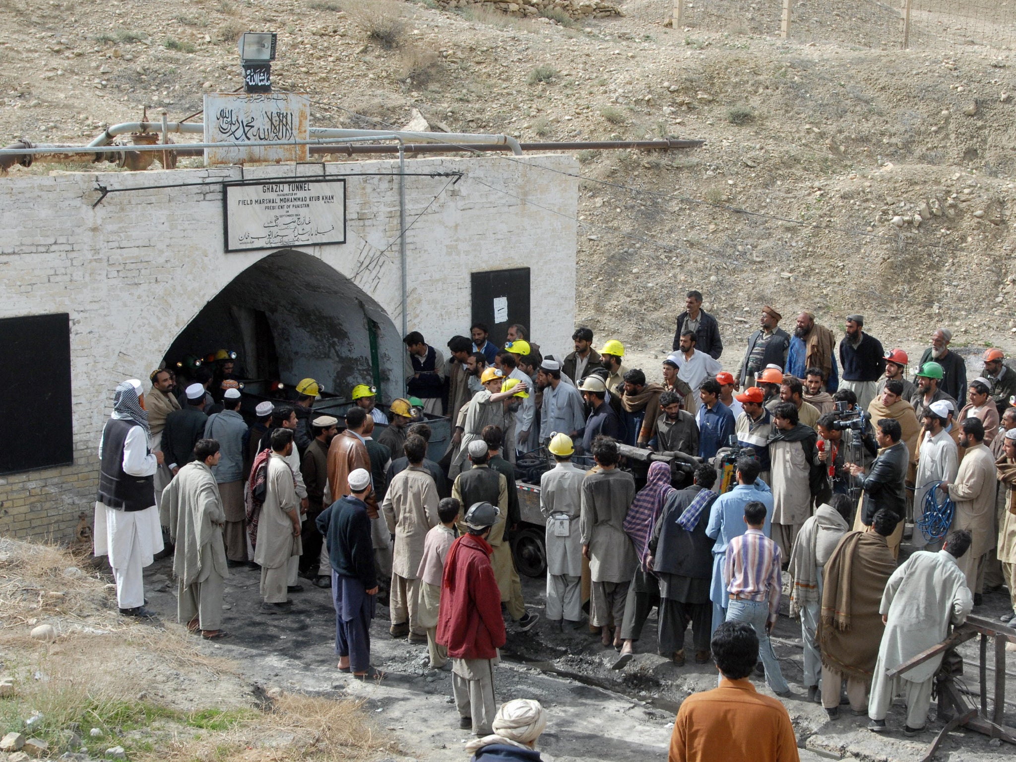 Coal miners brought to the surface after the explosion in a coal mine outside Quetta in 2009 where at least 12 miners were killed and 26 injured
