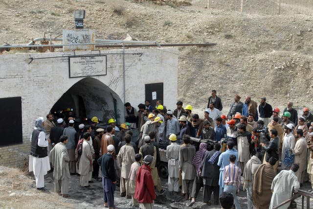 Coal miners brought to the surface after the explosion in a coal mine outside Quetta in 2009 where at least 12 miners were killed and 26 injured