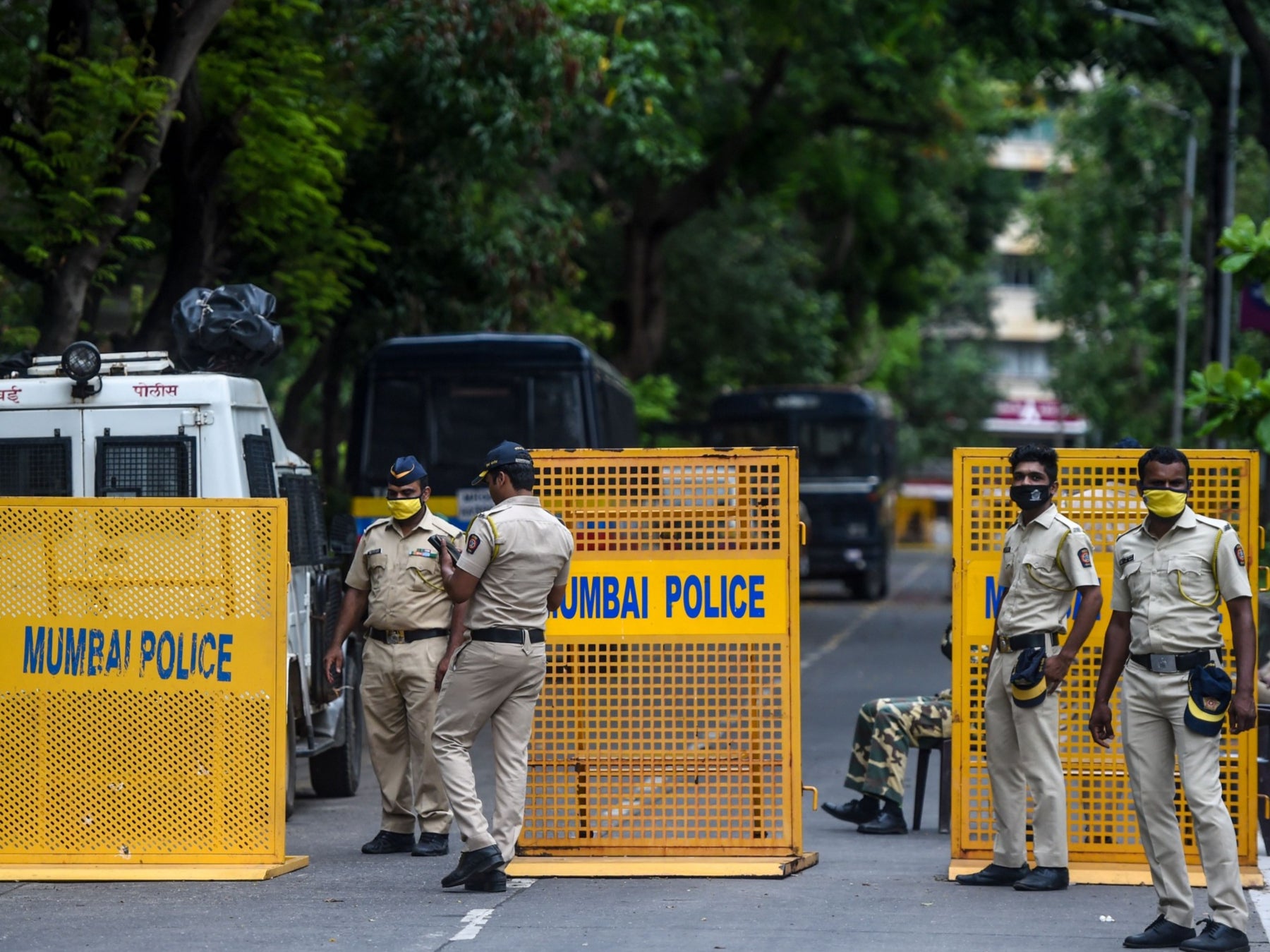 Police stand guard outside the Consulate General of China in Mumbai in June after a violent border brawl that left at least 20 Indian soldiers dead