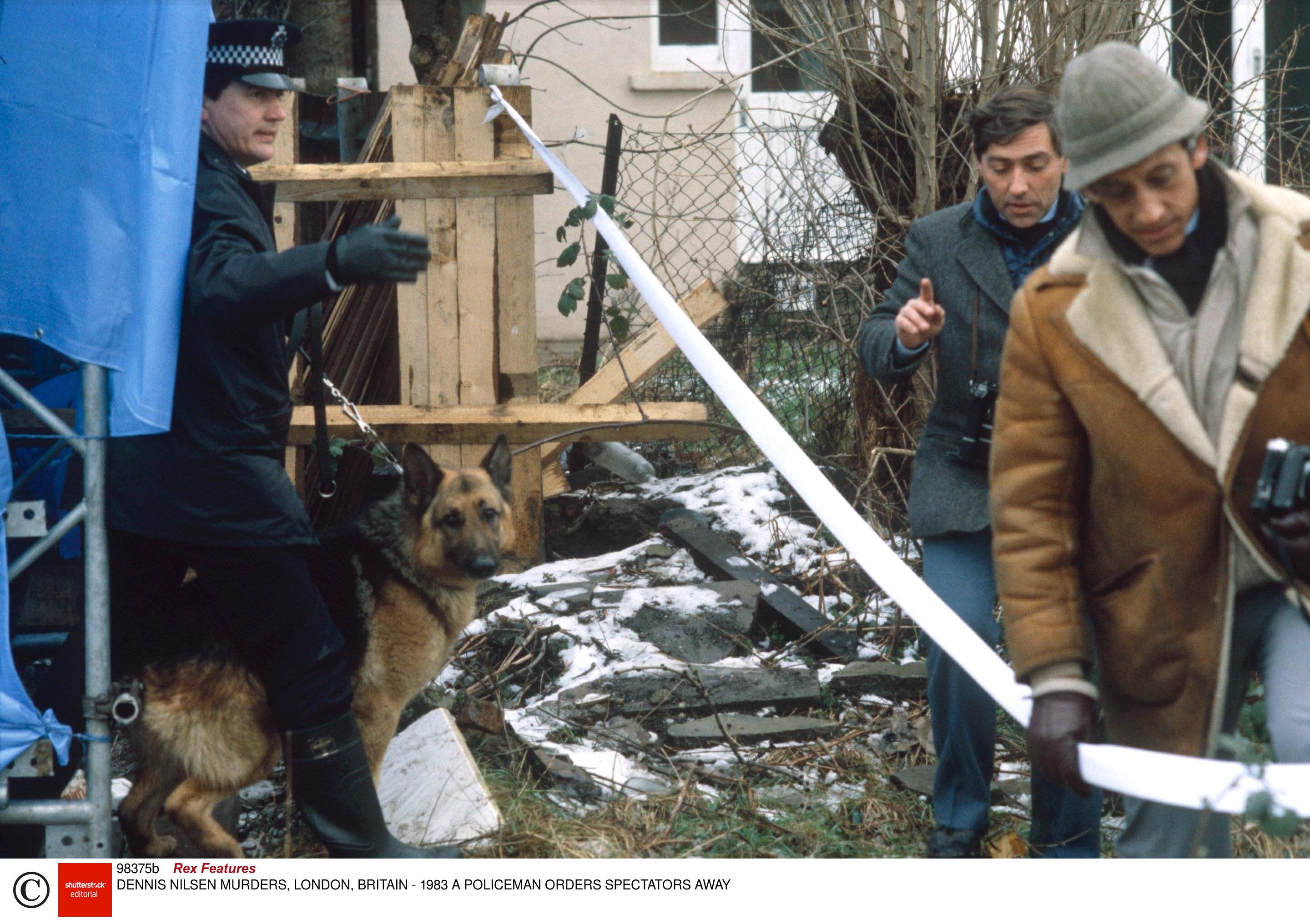 Policeman orders spectators away at Nilsen crime scene in 1983