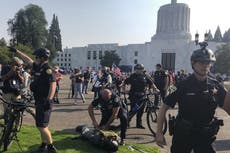 Pro-Trump and BLM protesters clash in violent scenes as experts warn election will bring social unrest