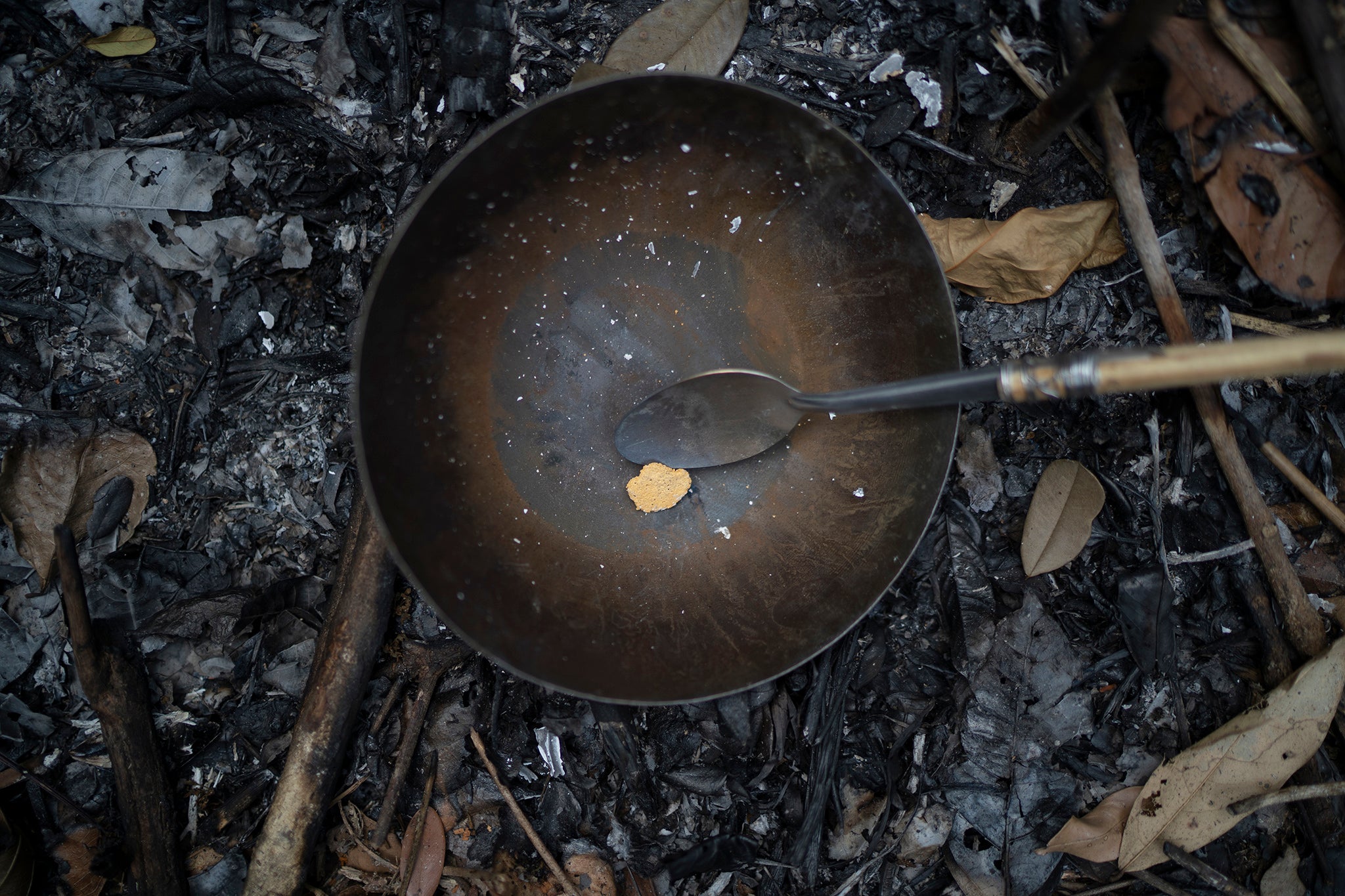 Gold sits in a pan moments after being torched to eliminate any mercury left