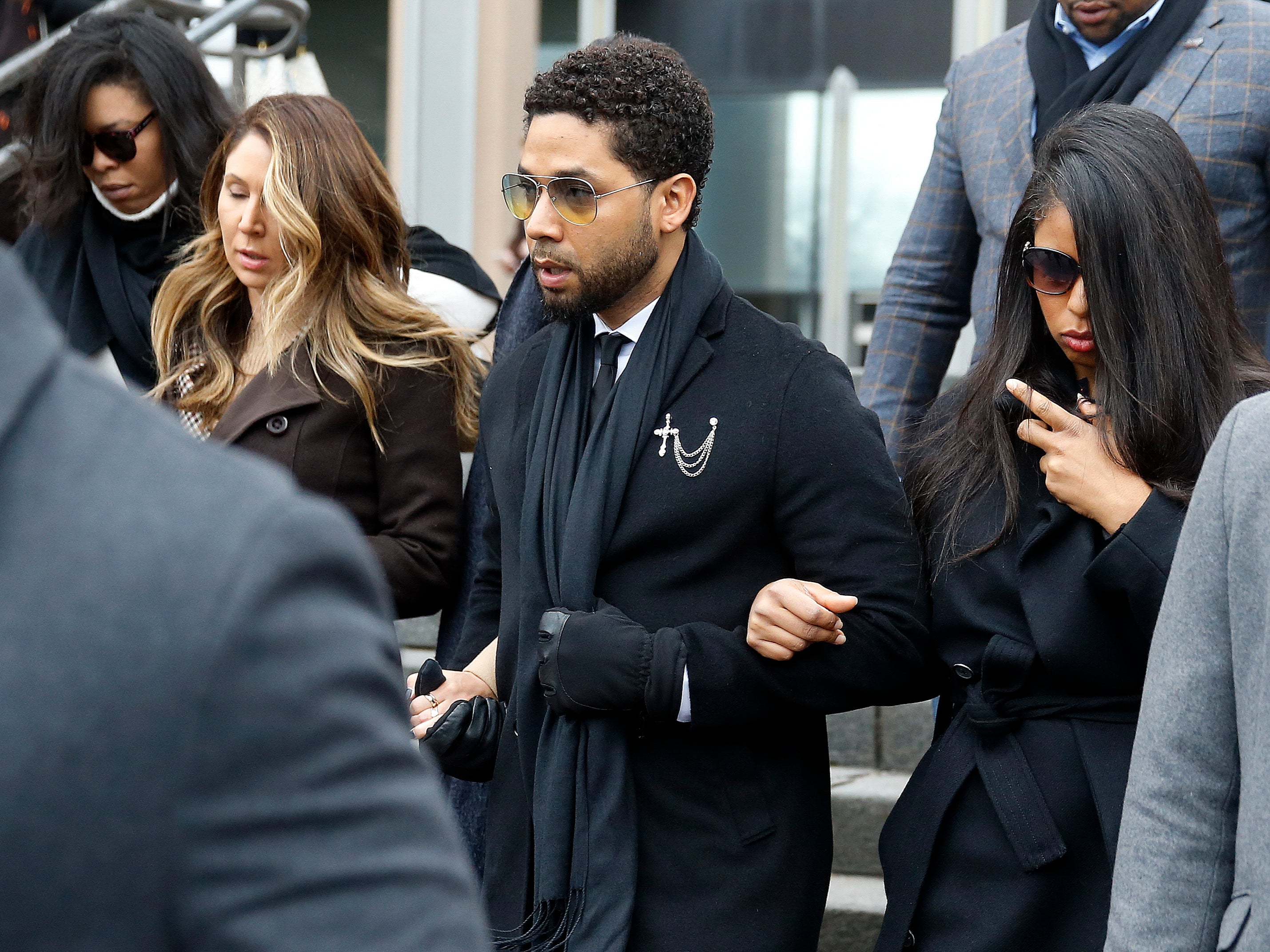 Smollett (centre) leaving court after pleading not guilty back in February, 2020