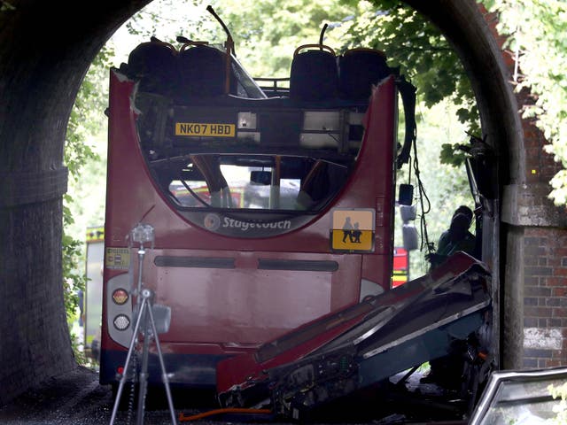 Schoolchildren were sat on top deck when roof was torn off in bridge crash