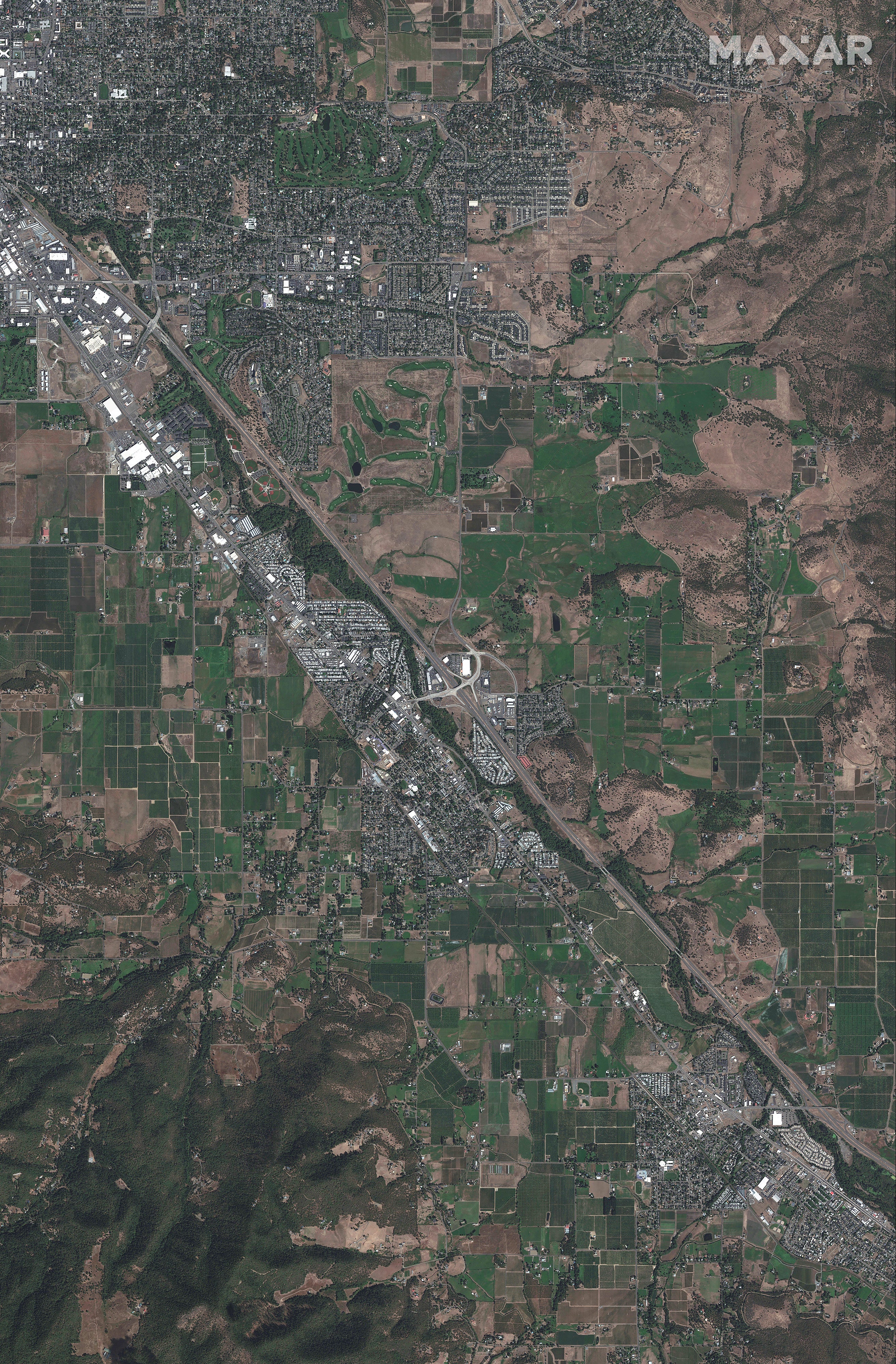 A satellite image shows an overview of Talent, Oregon after the wildfires
