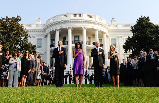 President Barack Obama, First Lady Michelle Obama, Vice President Joe Biden and Jill Biden observe a moment of silence to mark the 12th anniversary of the 9/11 