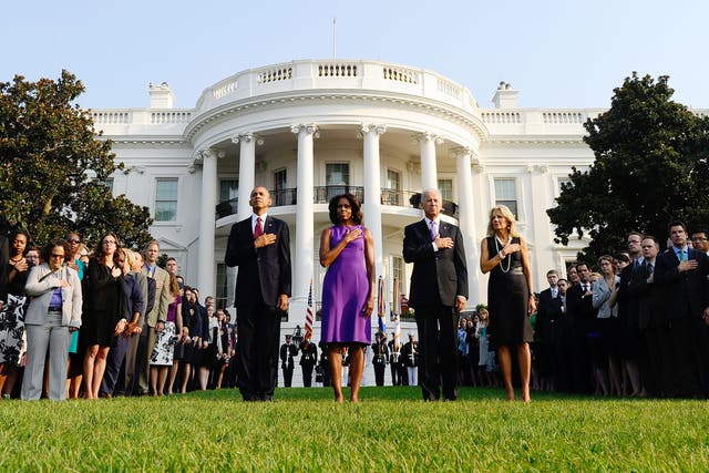 President Barack Obama, First Lady Michelle Obama, Vice President Joe Biden and Jill Biden observe a moment of silence to mark the 12th anniversary of the 9/11 
